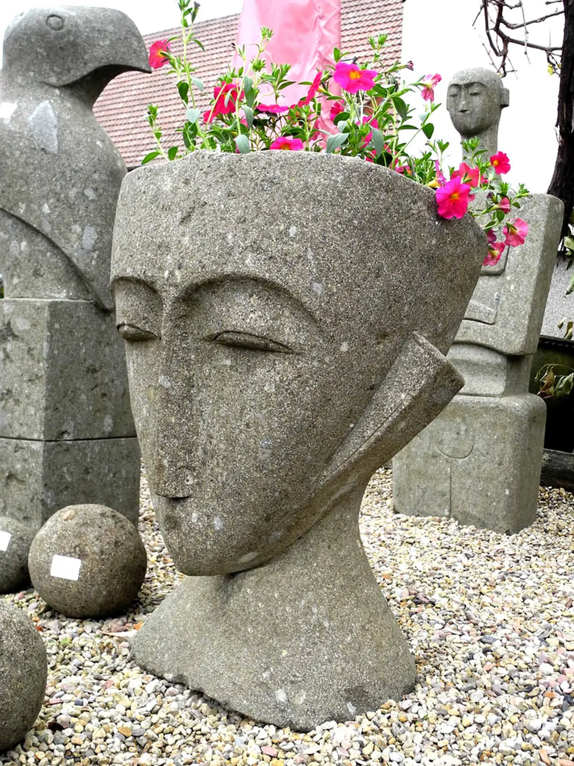  Product image 2 of the product “Abstract head hollowed out for plant, 80 cm height natural stone (Basanit), ”